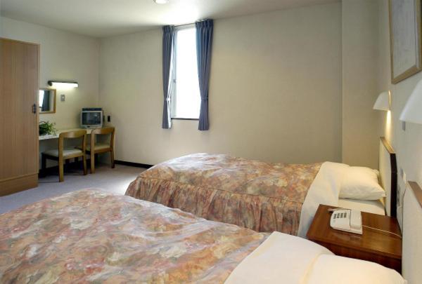 Business Hotel Prince Τακαμάτσου Δωμάτιο φωτογραφία